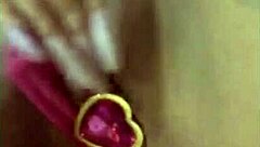 This latina beauty grabs her dildo and masturbates solo in her cozy little home.