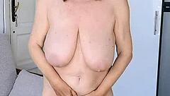 mature milf strips lingerie teases big tits toys shaved pussy closeup 😏