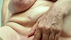 mature milf strips lingerie teases big tits toys shaved pussy closeup 😏