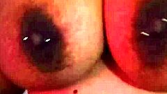 Latina amateur slips dildo in while shaking big natural tits like a slut at home.