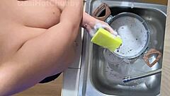 Horny Indian maid flashes big natural boobs on webcam while washing dishes solo