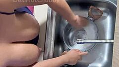 Horny Indian maid flashes big natural boobs on webcam while washing dishes solo