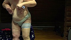 Chubby Russian milf shakes juicy ass and big tits while dildoing pussy in stockings on webcam homemade