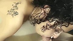 A skinny slut eagerly licks cum during her sloppy blowjob.