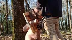 bound european milf slut bent over in outdoor bdsm carcan takes facial cumshot and uro humiliation