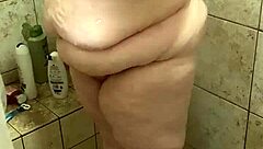 This curvy bbw wife soaps her big ass and natural tits in the shower solo. Part 2.
