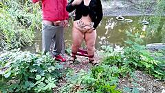 Horny Stepmom Milks Stepson's Dick While Fingering Wet Pussy Outside