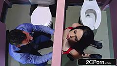 Busty brunette takes monster cock through glory hole!