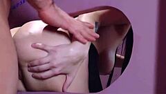 Busty brunette takes monster cock through glory hole!