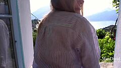 A couple shares intimate morning sex in italian lake como village