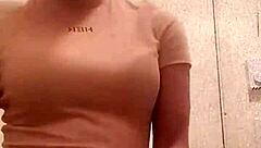 wanna see this black girl flash her chocolate ass in the bathroom?