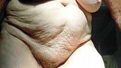 granny fucks her hairy pussy hard with fresh cucumber