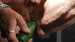 granny fucks her hairy pussy hard with fresh cucumber