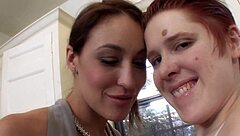 Hey check out this lesbo mommy pounding her redhead girl with a strapon, damn hot action!