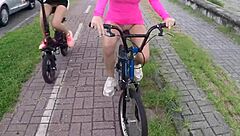 two busty babes barbara alves and pernocas bike without panties in the rain, voyeur style