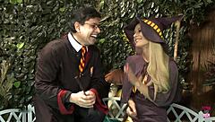 Blonde sorceress in stockings rides monster cock amid orgy chaos.