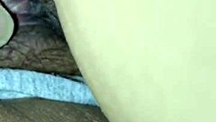 She plays with her smooth pussy in intimate close-up scene