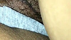 She plays with her smooth pussy in intimate close-up scene