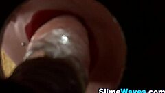 Bukkake Babe Grinds Gloryhole Toy in Heels