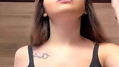 How do massive braless tits bounce in that tight tanktop?