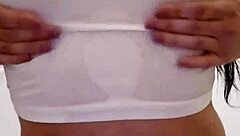 Emy Angel's wet t-shirt clings to every curve