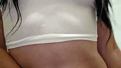 Emy Angel's wet t-shirt clings to every curve