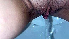 Check out these shaved pussies pissing in lace panties up close pov style.