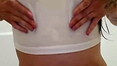 Emy Angel's wet t-shirt clings to every curve