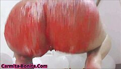 big booty latina shakes ass and sits on cake during wild webcam show