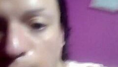 Natural titted ladyboy teases erotically in tight pink shirt