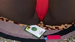 my red thong trimmed pussy tease in bedroom voyeur