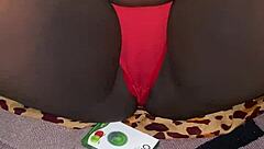 my red thong trimmed pussy tease in bedroom voyeur