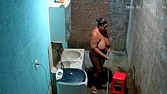 Hidden cam catches stepmom shaving pussy while stepson watches