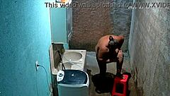 Hidden cam catches stepmom shaving pussy while stepson watches