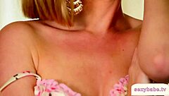 Blonde Babe Strips Seductively Ripping Lingerie Off in Cute Dance