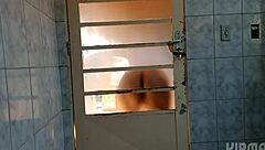 Behind the door crossdresser shakes ass in fascinating twerk display