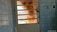 Behind the door crossdresser shakes ass in fascinating twerk display