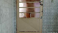 Behind the door crossdresser shakes ass in fascinating twerk display