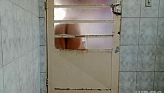 Behind the door crossdresser shakes ass in fascinating twerk display