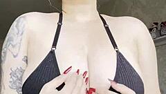 guy unloads thick cream all over her big natural tattooed tits