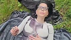 smoking on grass showing my huge natural tits boobs in sun garden