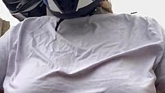 motogirl picks up guy on 99 bike grabs his hands on her big natural tits while riding he cums all over her tanned body