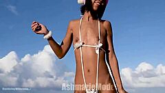 hairy pussy flashes under micro bikini during public christmas twerk dance