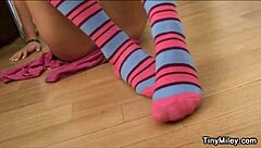tiny miley caresses her petite pussy through sexy stockings alone