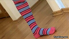 tiny miley caresses her petite pussy through sexy stockings alone