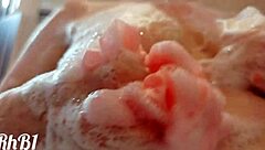 craving to soap up her juicy milf tits and redhead pussy?