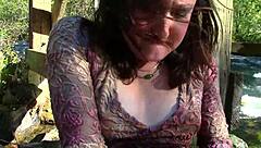 Hey check this sweet babe fingering pussy with vibrator outdoors