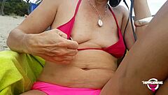 kinky mother flashes pierced nipples and pussy at crowded beach
