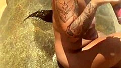 young african exhibitionist strips fully nude on crowded beach