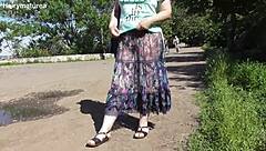 i'm a hairy mature flashing my pussy thru see-thru dress outside